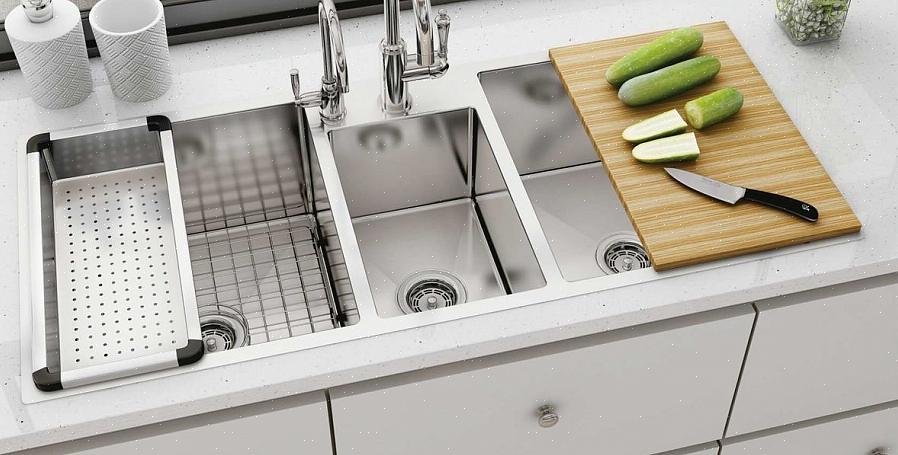 Questo è un lavello da cucina in acciaio inossidabile con due vasche che si trova nello stile drop-in